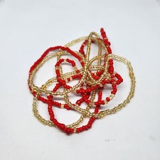 Cintura pancia elastica con perline in vita oro rosso e trasparente