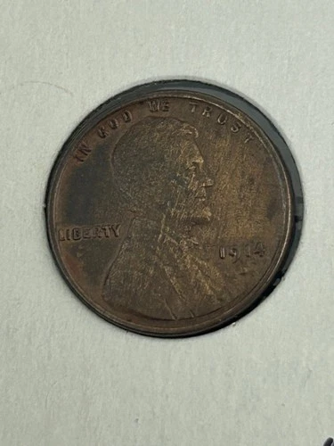 KEY 1914-D Lincoln penny. Looks AU Brown with neat toning.