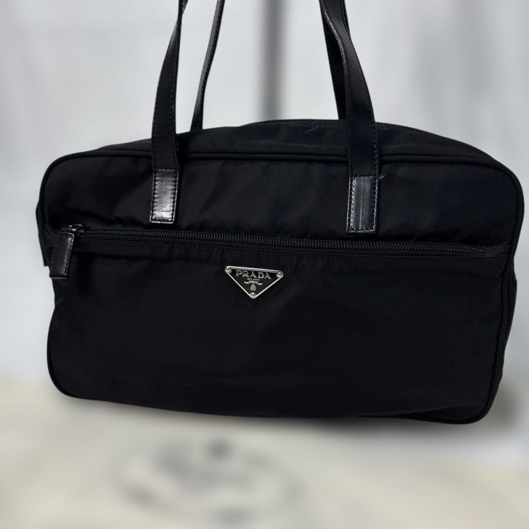 Prada Black Leather Handbag with Triangle Logo and Top Handle  