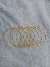 7 Bangles 18k Solid Gold. 1.4 mm. 8.25 Inches.