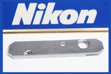 210171 NIKON NIKKORMAT FTN BOTTOM COVER REPAIR PART USED