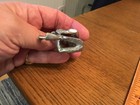 Miniature Pewter Cowboy in Sitting Position Removing His Boots — photo 4