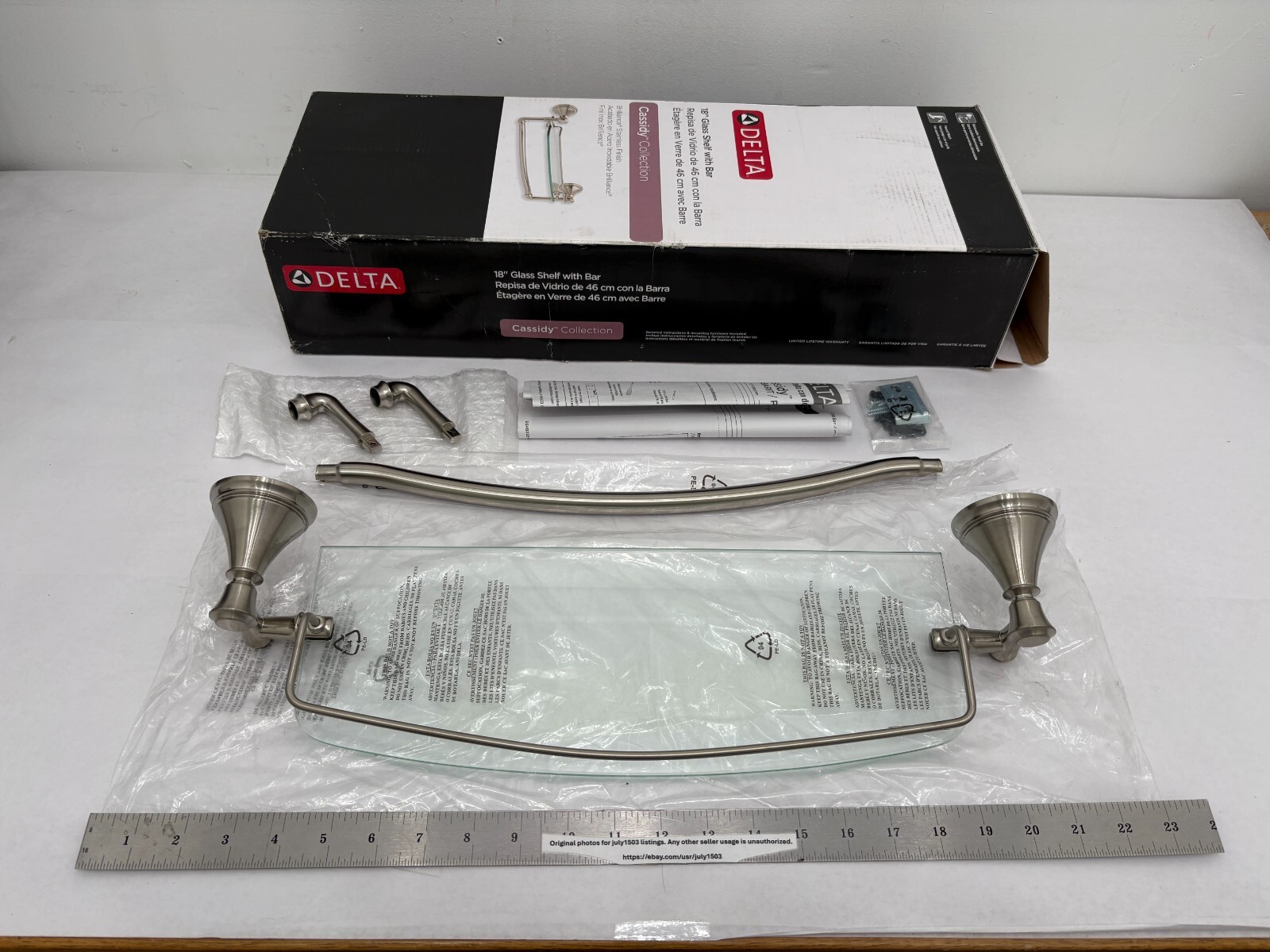 (1) NEW Delta Cassidy 18" Glass Shelf w/ Bar - BRILLIANCE STAINLESS - 79710-SS