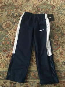 nike sweatpants with white stripe