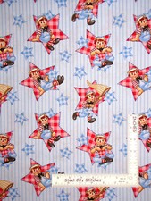 Raggedy Andy Sitting on Stars Blue Stripe Cotton Fabric SPX Spectrix By The Yard