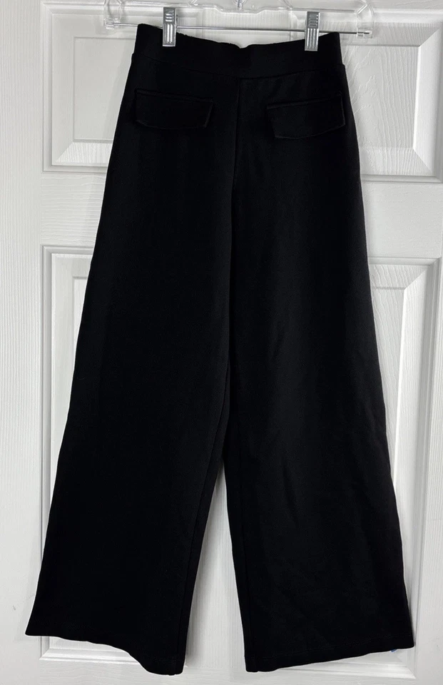 Pantalones Zara Niñas Pierna Ancha Talla 13-14 Negros Elásticos Tirar de Imitación Bolsillos Frontales Foto 3 de 4