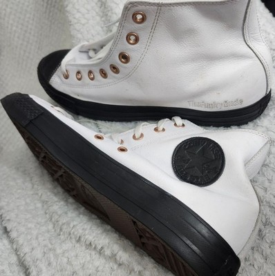 Converse Black and White High-Tops with the funky dude 