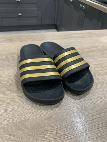 Adidas scarpa da piscina Adilette Aqua Slides nero oro taglia UK 4 EG1758