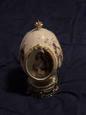 Magnificent Porcelain Home For The Holidays Musical Nativity In Egg Shape Manger