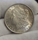1883 O US Morgan Silver Dollar $1 Original Toning Unc.
