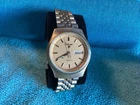 Vintage Pulsar By SEIKO Men's Gold Tone Quartz Day Date Watch 34mm.