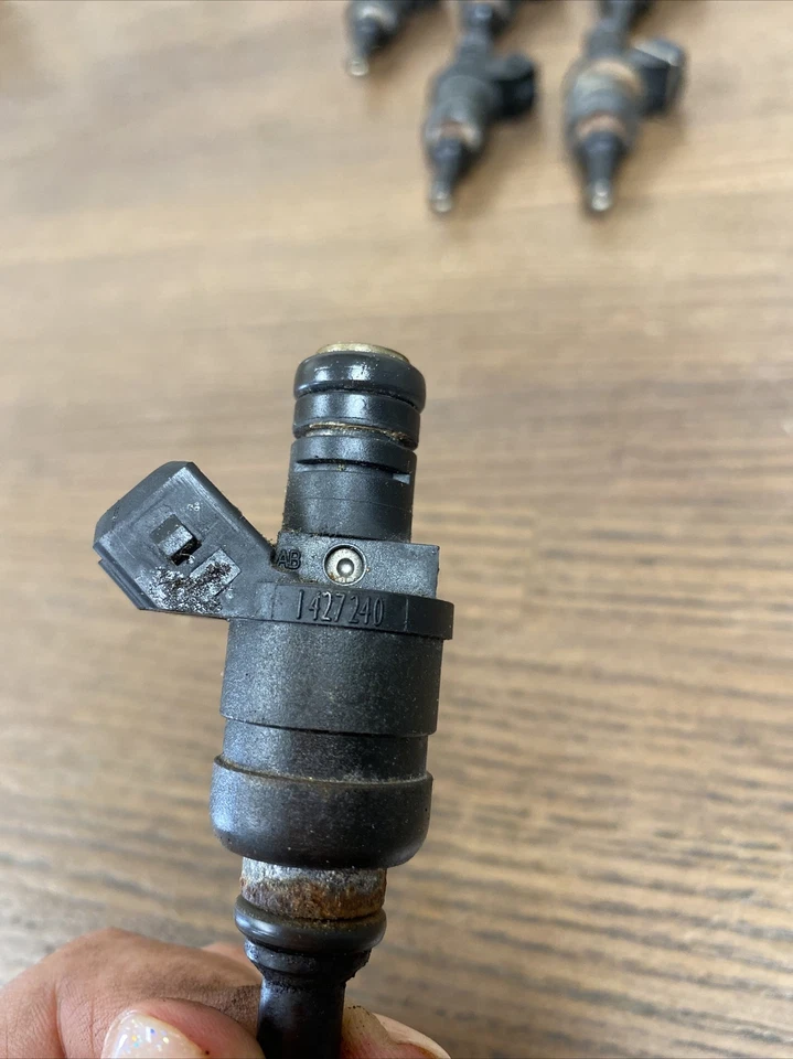 Inyectores de combustible OEM BMW X3 Z3 Z4 528i 323i 328Ci 323Ci 525i 325xi 320i 1427240 Foto 3 de 3