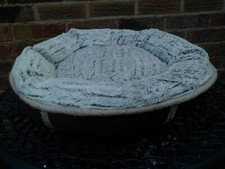 Brown doughtnut bed for cat or small dog