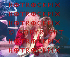 8X10.5 PHOTO OF STEVE CLARK  JOE ELLIOTT OF DEF LEPPARD IN CONCERT
