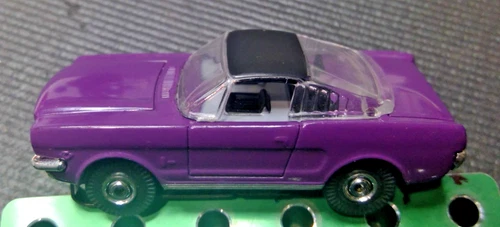 Johnny Lightning 65 Mustang Fastback Slot Car with Original NOS Aurora Chassis