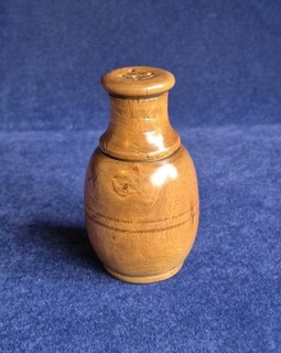 An antique turned sycamore spice shaker/caster of lovely mellow colour.