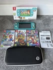 Nintendo Switch Lite  With Case And 7 Games. Preowned