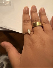 Marquise solitaire yellow gold engagement ring 