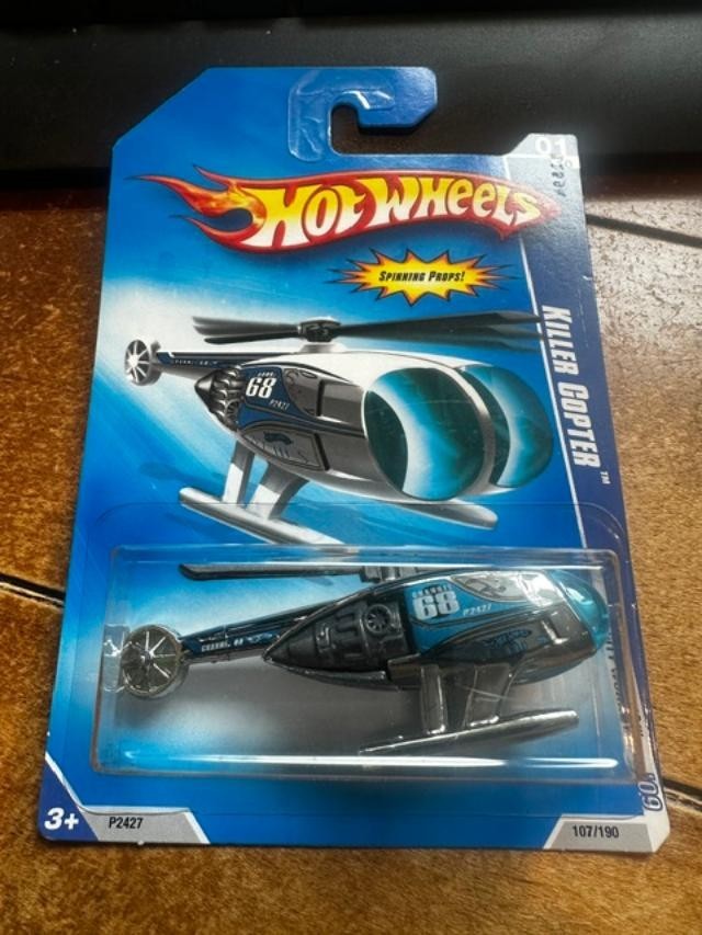 2009 Hot Wheels HW City Works Killer Copter #107 Chrome/Blue