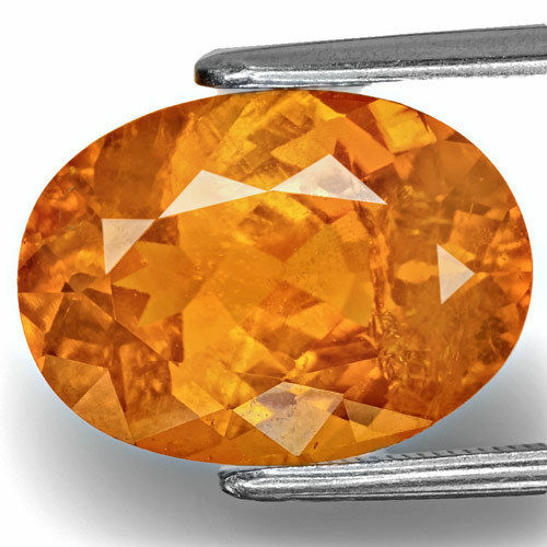 TAJIKISTAN Clinohumite 6.37 Cts Natural Untreated Lustrous Intense Orange Oval - Picture 1 of 3