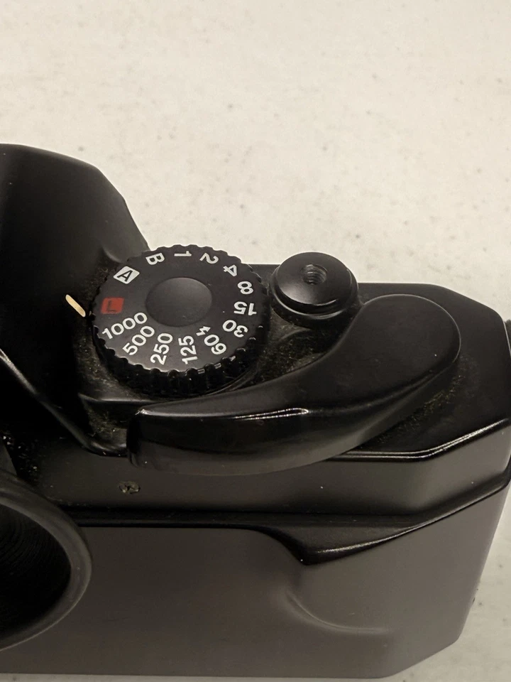 Cámara Canon T60 35 mm - SOLO CUERPO - Con manuales sin probar para reparación o piezas Foto 4 de 4