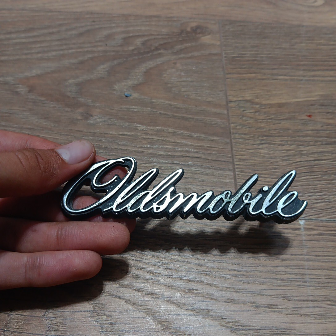Oldsmobile Supreme F85 Grill Script Emblem PN#418829 - Photo 1