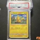 The Pokémon Company SM Black Star Promo Pikachu SM183 Holo EN PSA 8