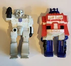 1985 Hasbro Transformers Erasers 2 Piece Optimus Prime & Megatron Rubber