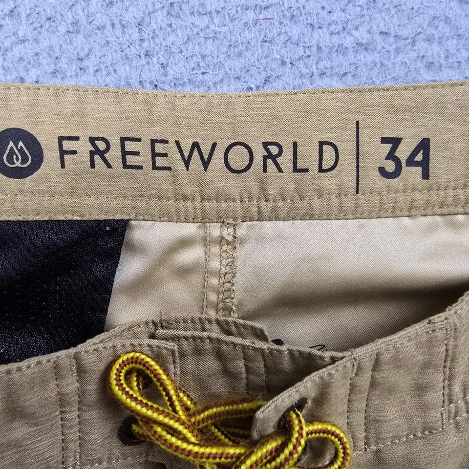 Pantalones Cortos Freeworld Para Hombre 34 Marrón Ligero Exterior Patinador Suelto Híbrido Absorbente Foto 3 de 4