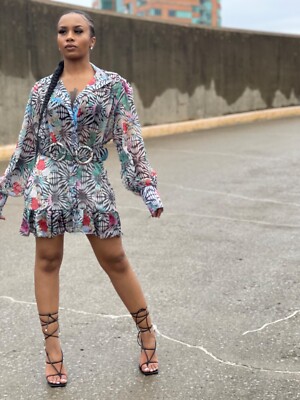 Variety of NEW womens clothing with tags, different sizes, different styles.
