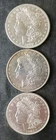 1879 O, 1886, and 1921 D $1 Morgan Silver Dollars