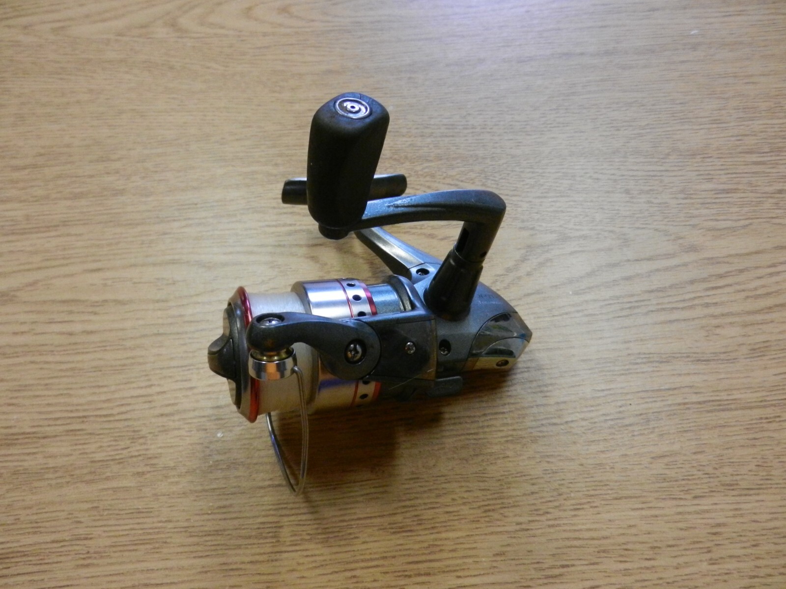 Quantum Optix OP 30 Spinning Fishing Reel Winds Smoothly W/ Some Wear Used 