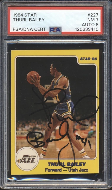 1984-85 Star Basketball Autogramm Thurl Bailey #227 signiert PSA 7 PSA/DNA Auto 8