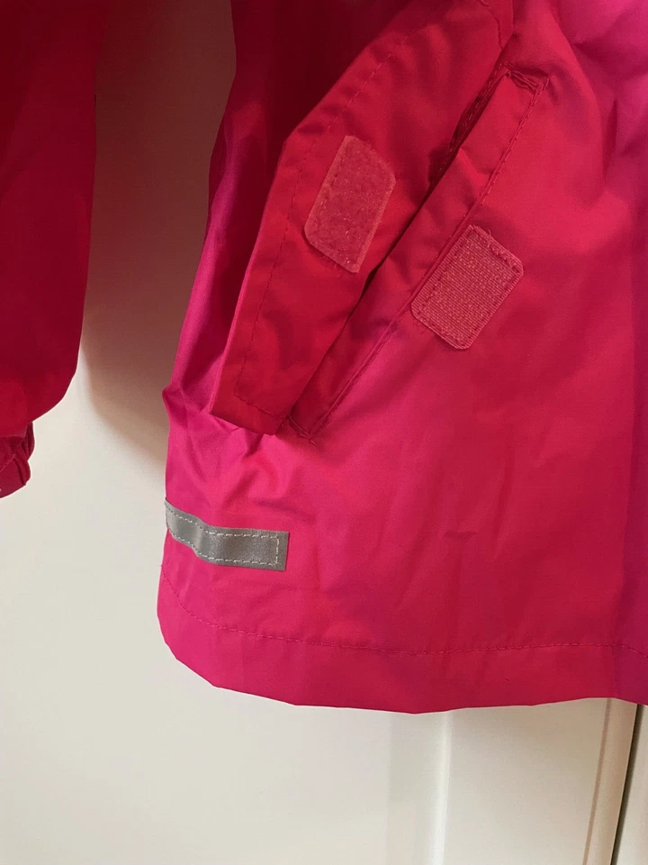 Impidimpi Kinder leichte Regenjacke mit Reflektoren und Kapuze pink Gr. 110/116 - Bild 4 von 4