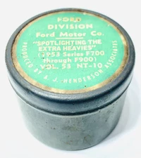 VINTAGE FORD DIVIDION FILM TIN CONTAINER "SPOTLIGHTING THE EXTRA HEAVIES” EMPTY