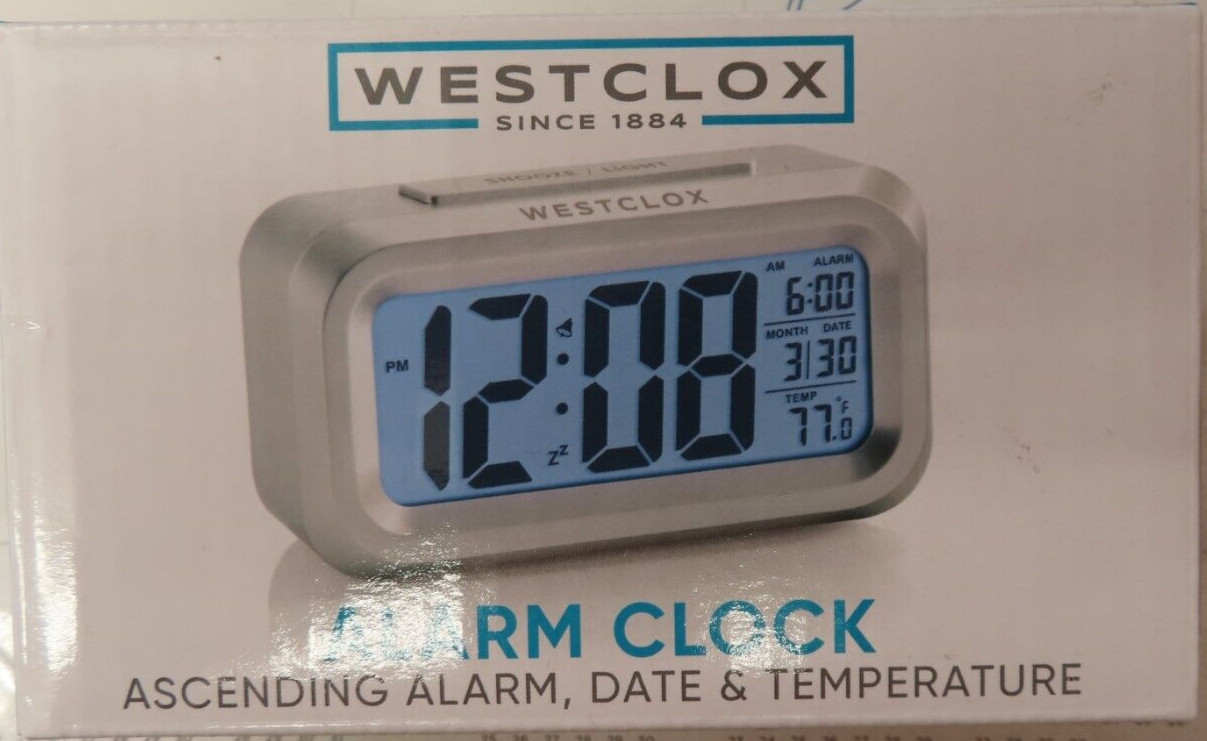 NEW Westclox Blue LCD Alarm Clock 70045A Battery Powered Silver Digital