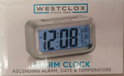 NEW Westclox Blue LCD Alarm Clock 70045A Battery Powered Silver Digital