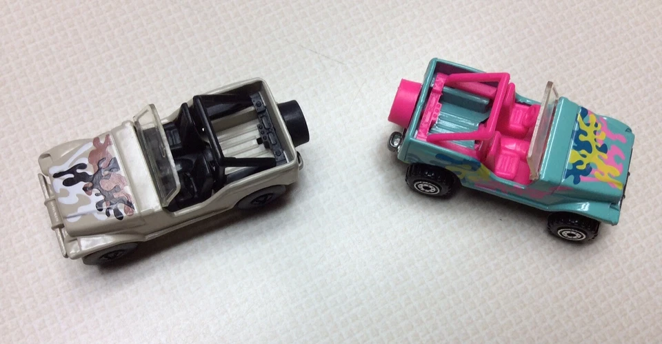 2 Vintage Hot Wheels 1990 Jeep 4X4 Trailbuster Diecast Cars Green/Pink-Tan/Black - Image 3 of 4