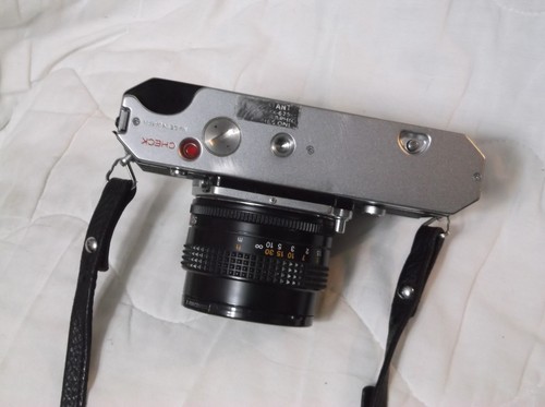Konica Autoreflex T 35 mm fotocamera reflex obiettivo Hexanon AR 50 mm F/1.8 testata - Foto 8 di 11