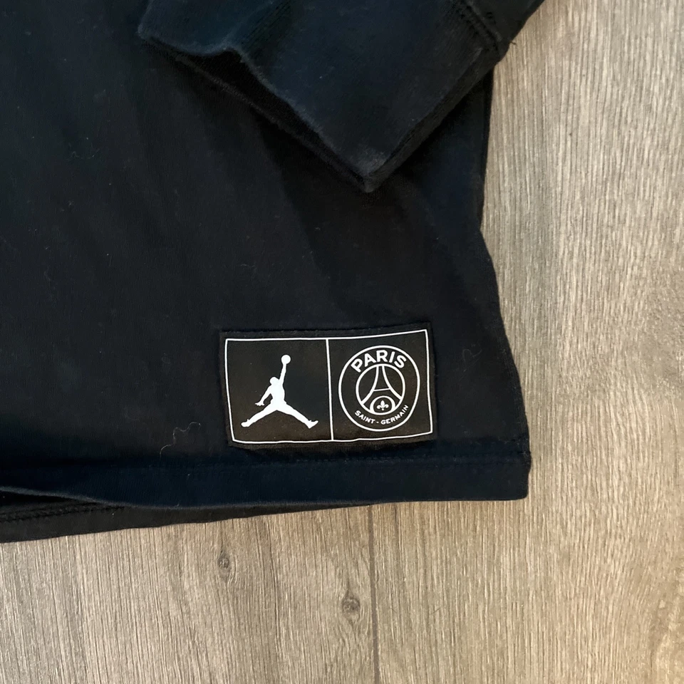 Camiseta Jordan Paris Saint Germain Manga Larga Negra Hombre Grande Foto 3 de 4