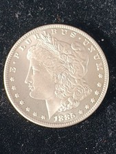 One Dollar Morgan 1885 o  FAUSSE PIECE. PEPLIQUE