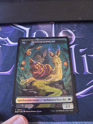 Snail Token (Black 1/1)   Thundertrap Trainer (U 1/1), foil
