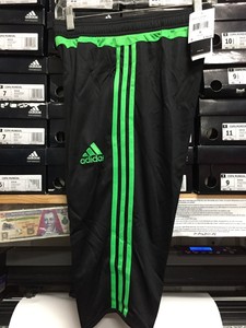 black and green adidas pants