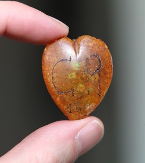 antique Charles the second carved amber heart with CR royal cypher 17th century