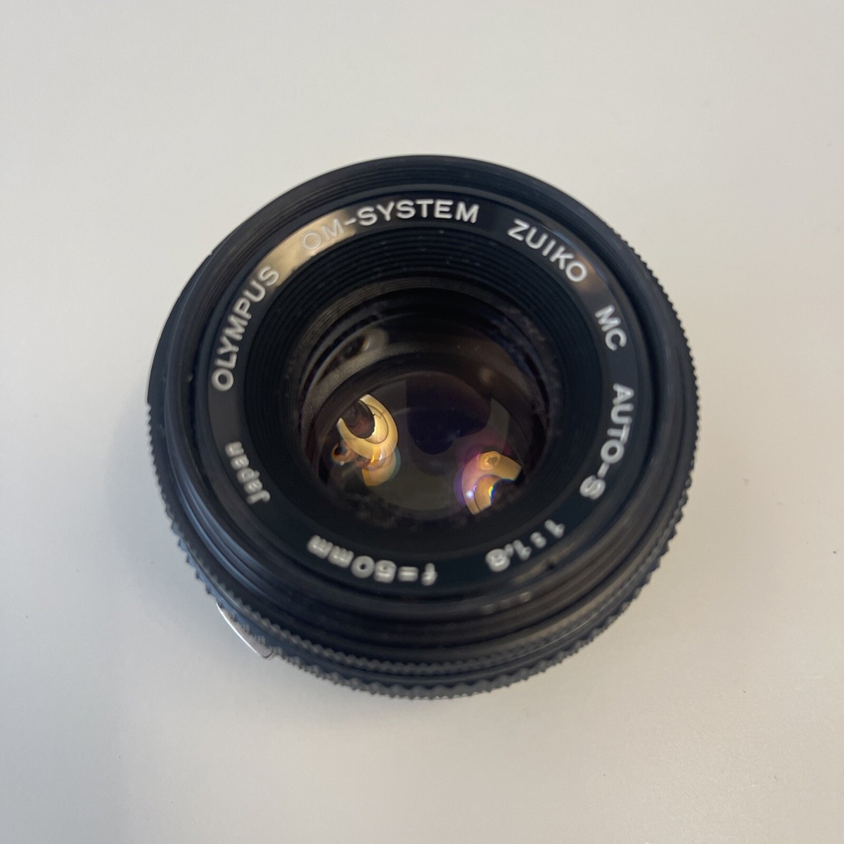 Olympus OM-System Zuiko 50mm F/1.8 MC Lens, Spider Fungus On Front Element Olympus OM-System Zuiko 50mm F/1.8 MC Lens, Spider Fungus On Front Element