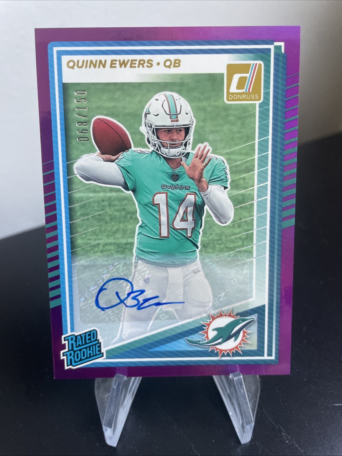 2025 Panini Donruss Rated Rookie Quinn Ewers #342 Purple Auto /150 Dolphins RC