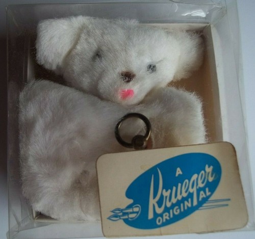 antique teddy bear with music box inside