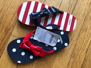 red bow flip flops