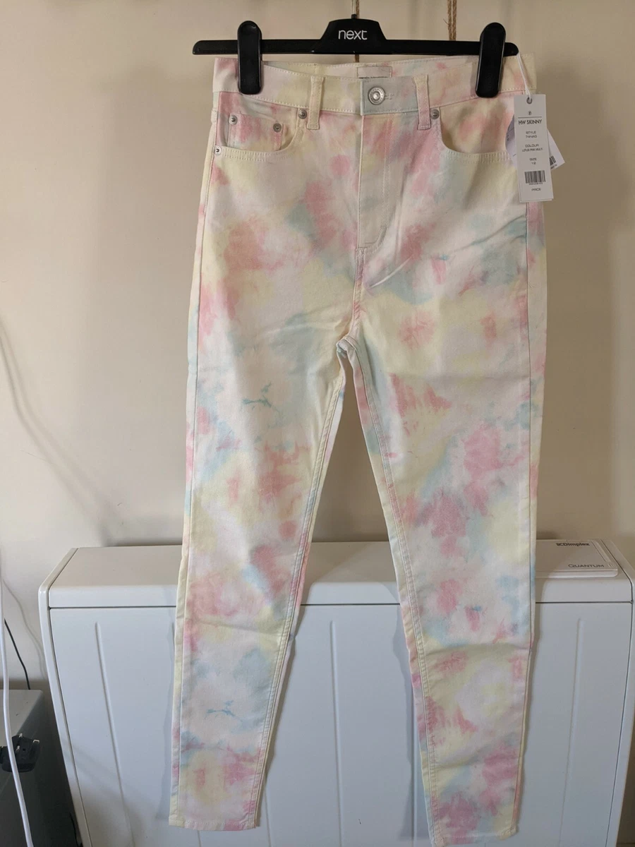 Pink tie store dye jeans