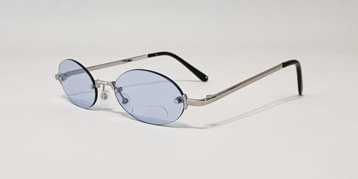 Oval Shaped Rimless Sunglasses Metal Frame Colored Rimless